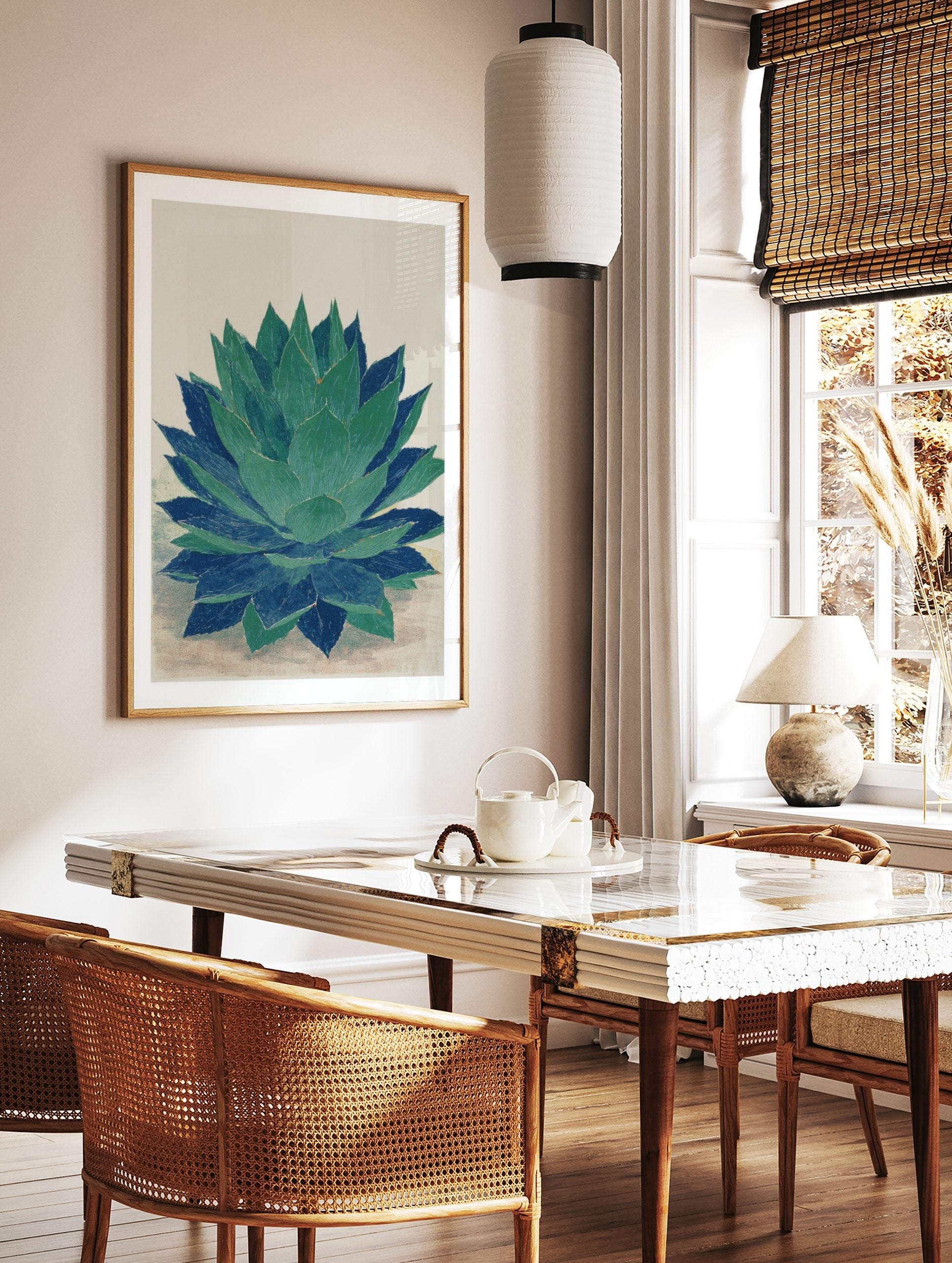 Agave plant botanical wall art print in green and blue with textured illustration style, in a styled room mockup