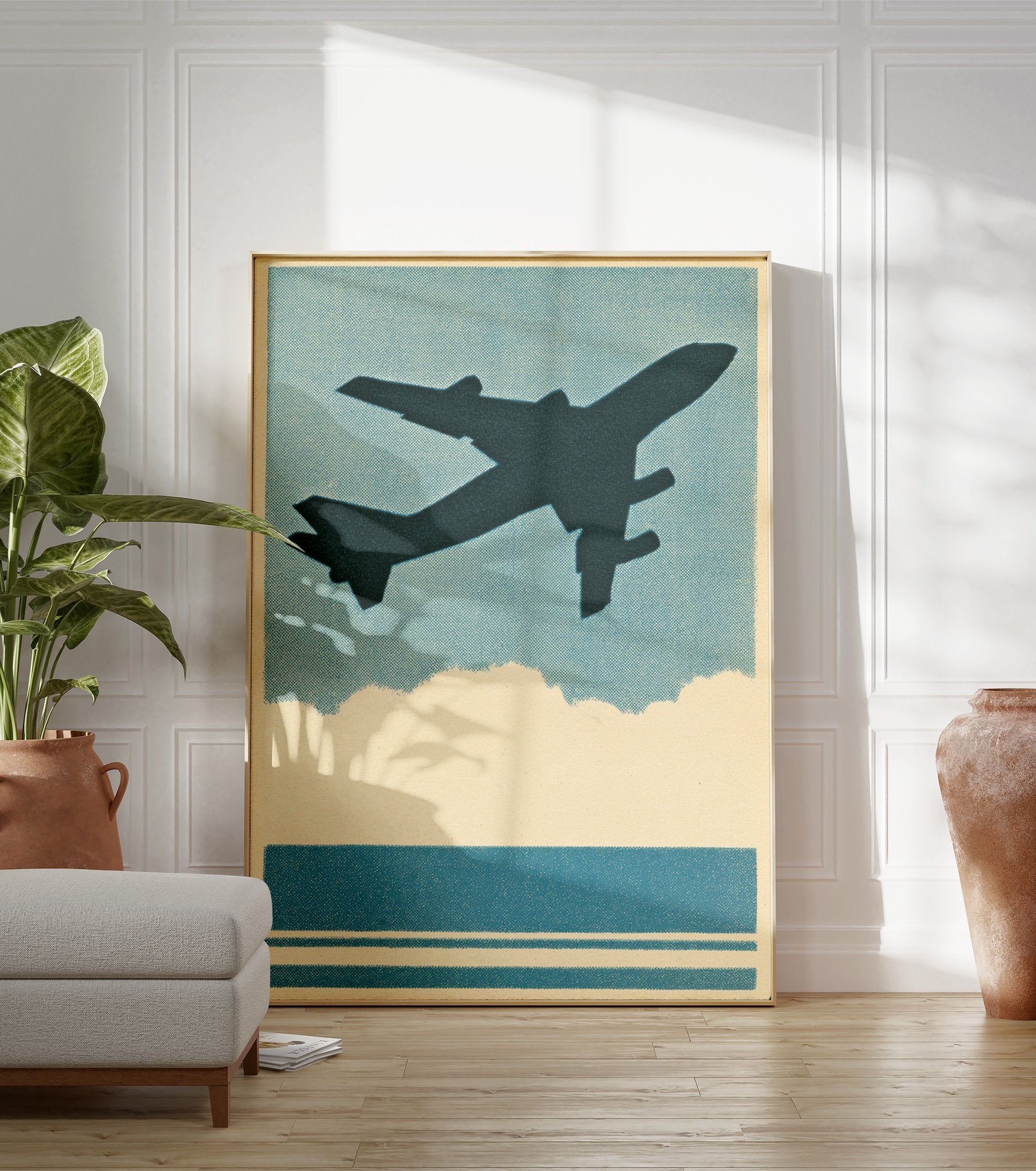 Vintage airplane poster featuring a dark silhouette of a plane flying in a blue sky above clouds and water, with a halftone texture. - Image 3