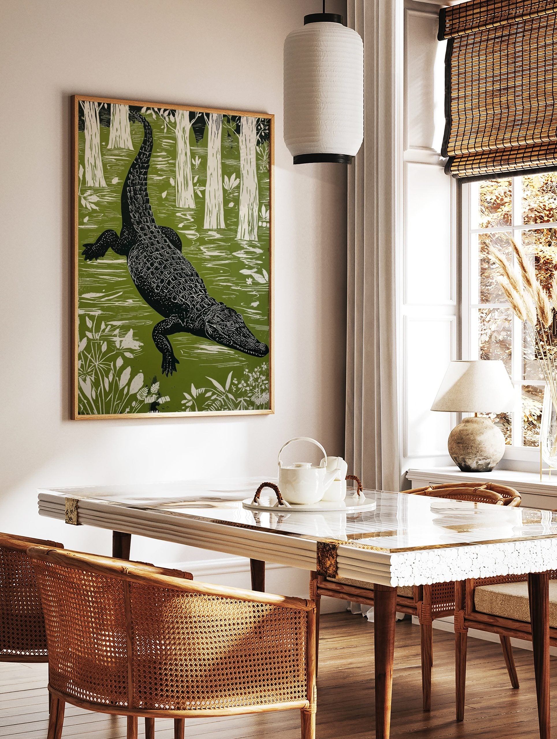 Linocut style alligator wall art swimming in a green swamp with white trees and plants in portrait, in a styled room mockup