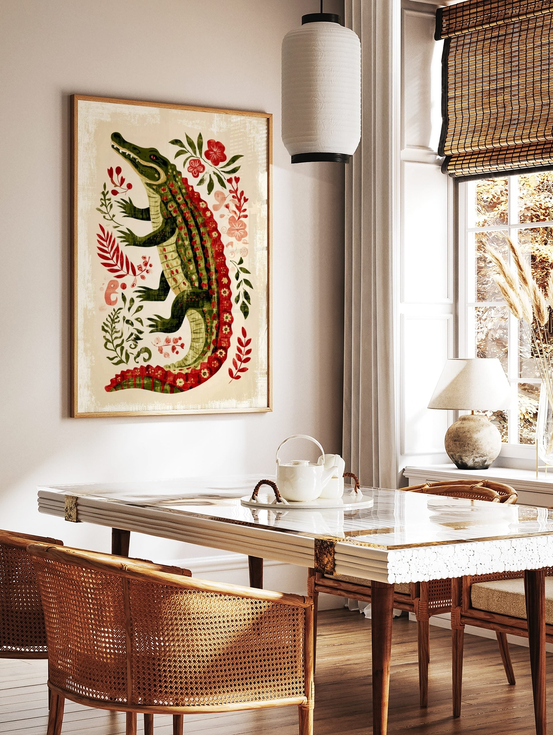 Illustrative green alligator with red patterned scales and red eyes, surrounded by green leaves and, in a styled room mockup