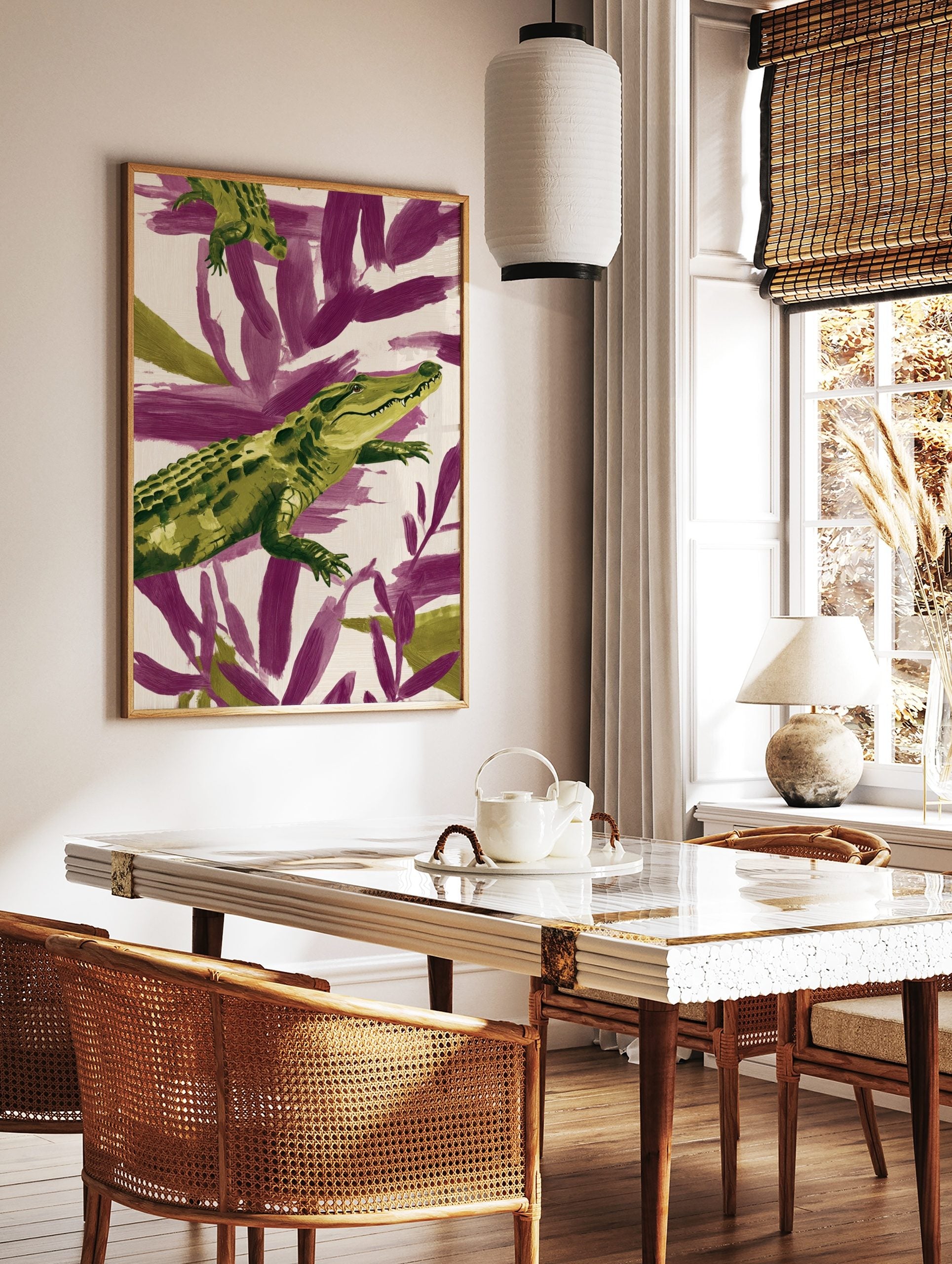 Green alligator illustration against purple and cream abstract brushstrokes, in a styled room mockup