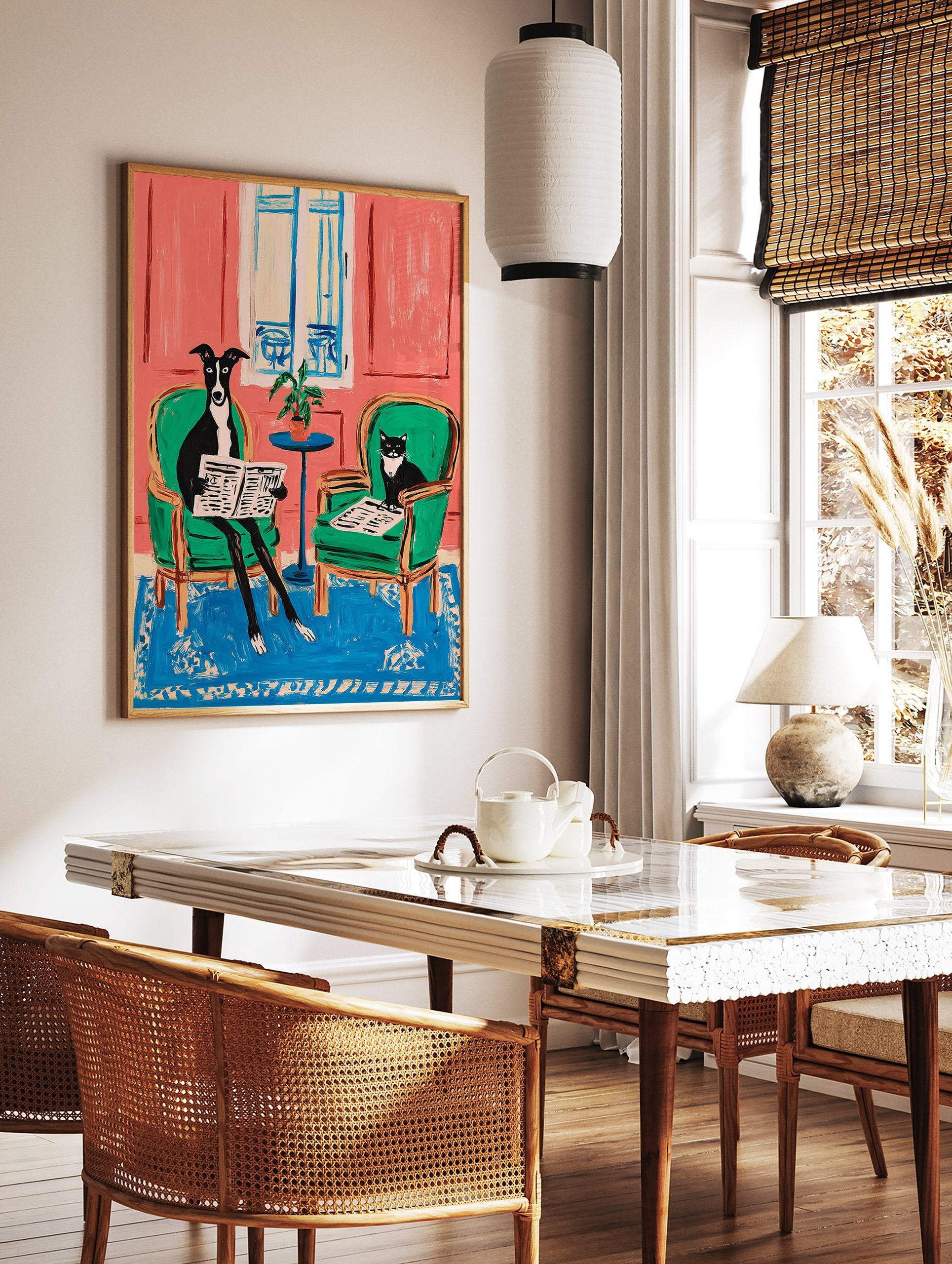 Illustrative animal wall art featuring a black and white dog and cat reading newspapers in green chairs against a pink wall. - Image 2