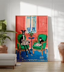 Illustrative animal wall art featuring a black and white dog and cat reading newspapers in green chairs against a pink wall. - Image 3
