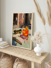 Impressionist cocktail poster showing an orange drink with ice, sunglasses, and a book on a table in a sunny street scene. - Image 4