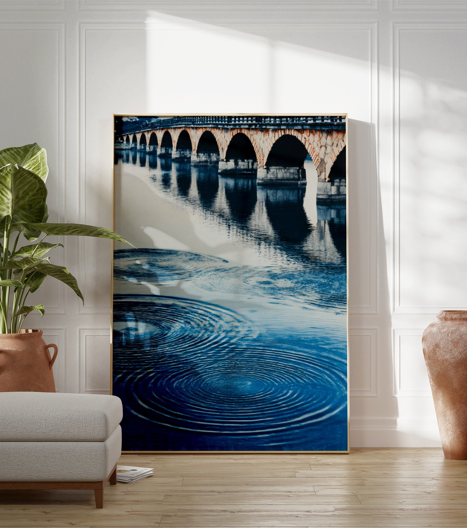 A blue water arch bridge poster featuring a stone bridge with multiple arches reflected in rippling water. - Image 3