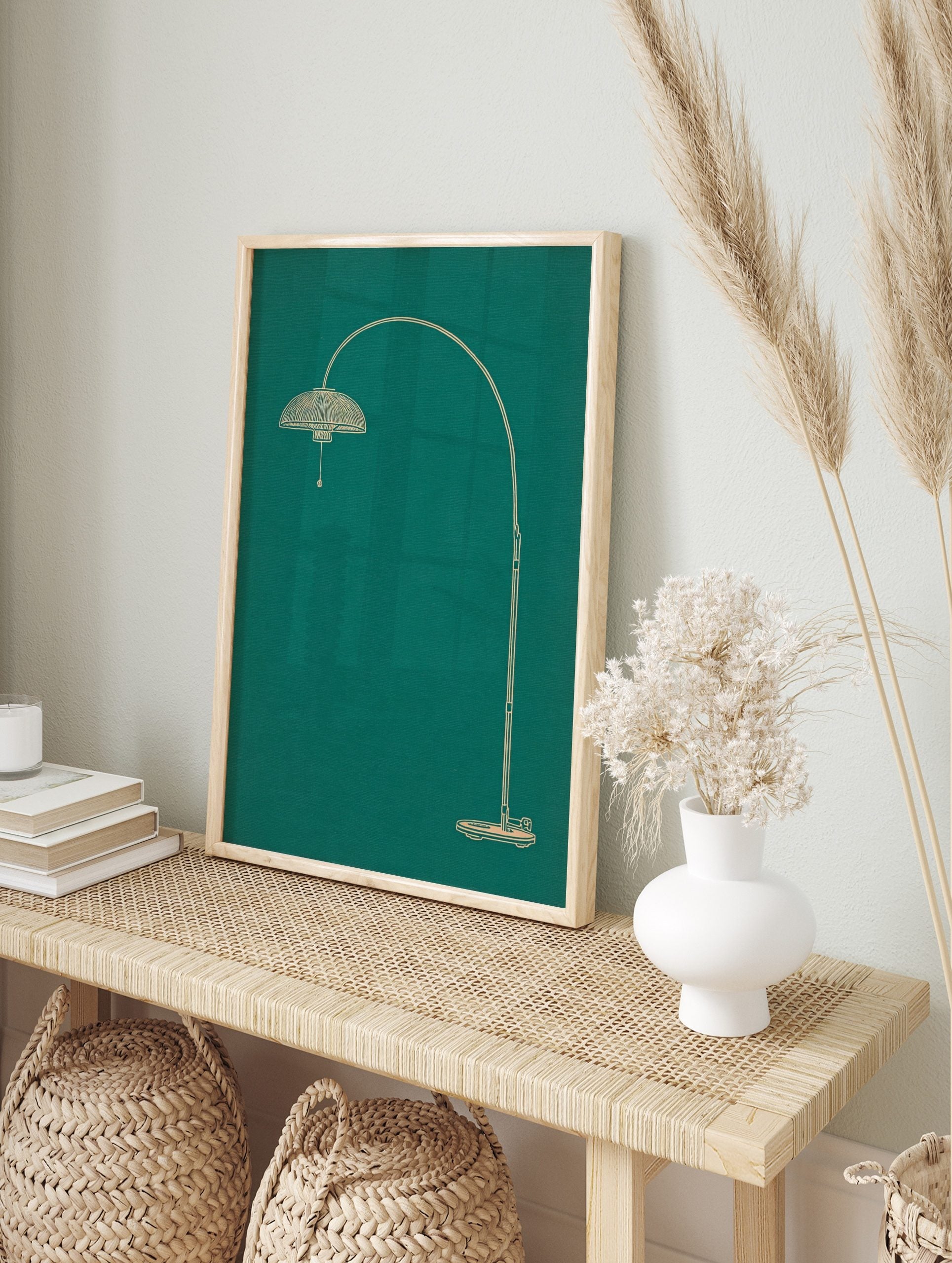 Minimalist line art illustration of an arched floor lamp in light beige on a deep teal, in an alternate framed mockup