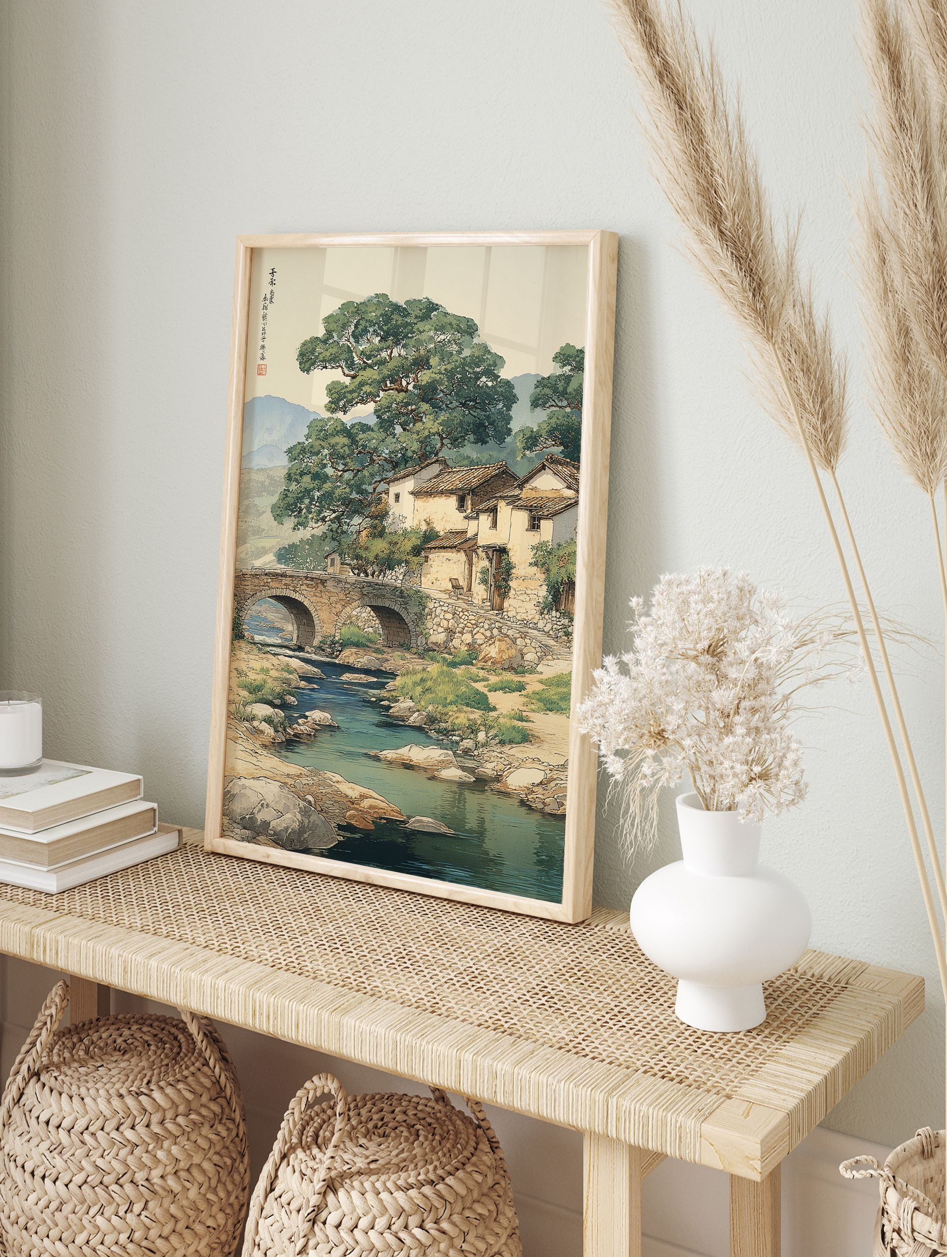 Traditional Asian landscape wall art depicting a Chinese village with a stone bridge over a river, large trees, and mountains. - Image 3