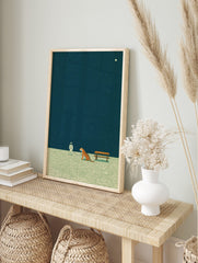 Illustrative print of an astronaut walking a tiger on a leash under a dark, starry sky with a, in an alternate framed mockup