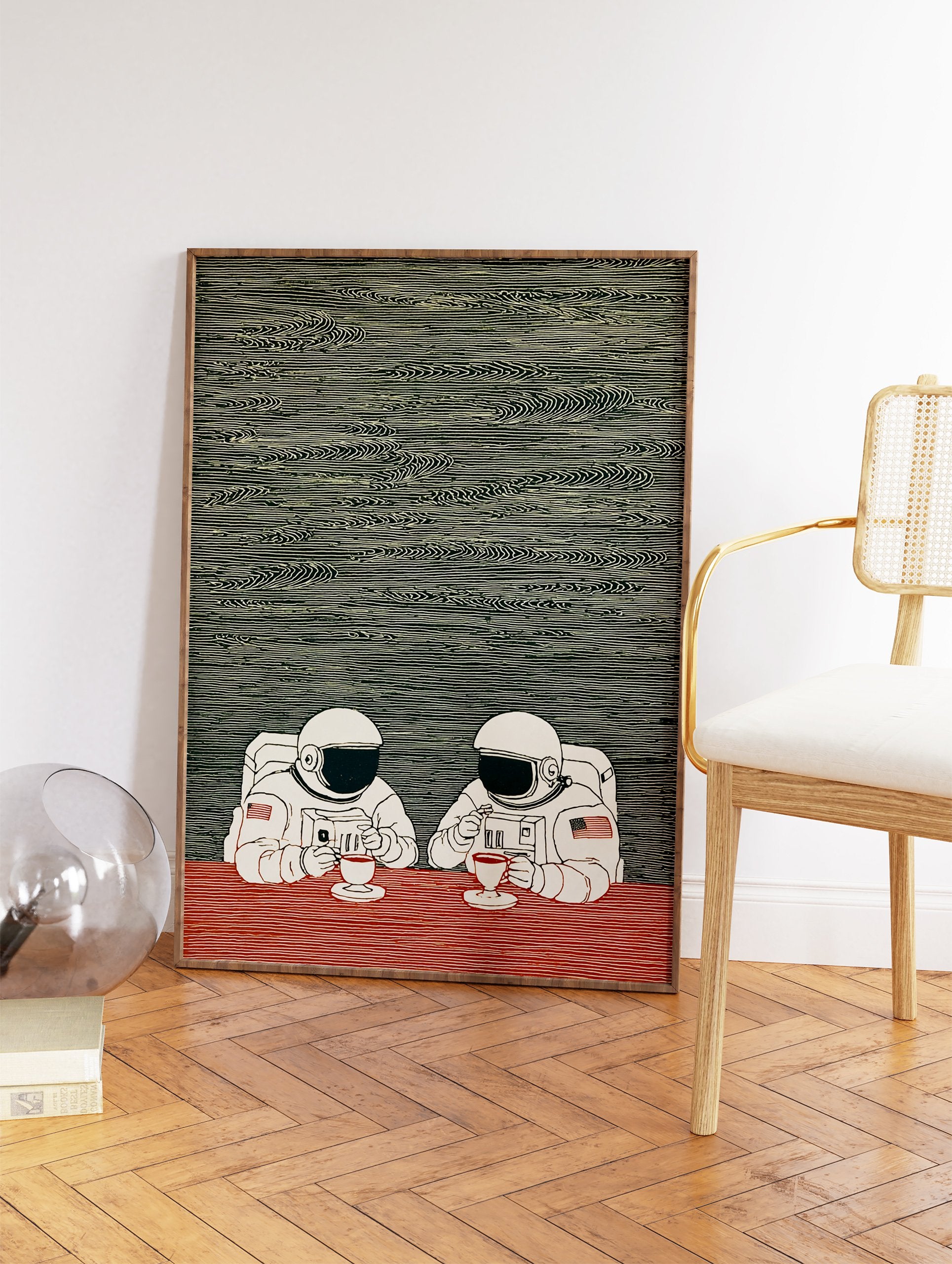 Illustration of two astronauts in white suits sitting at a red table, drinking coffee against a dark green patterned background. - Image 2