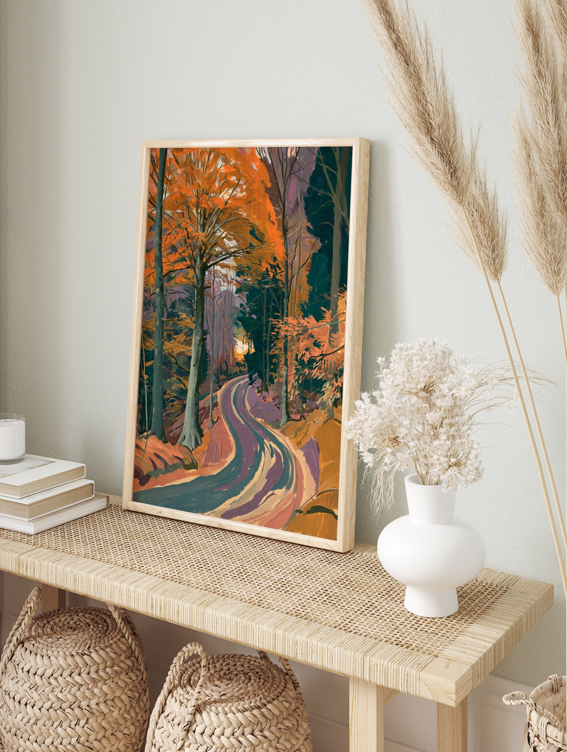 Illustrative autumn forest road print with orange trees and winding path, in an alternate framed mockup