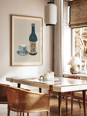 Japanese autumn sake bottle and blue patterned teacup still life art print, in a styled room mockup