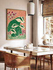 Illustrative print of an adult badger and three young badgers in green and off-white, surrounded by, in a styled room mockup