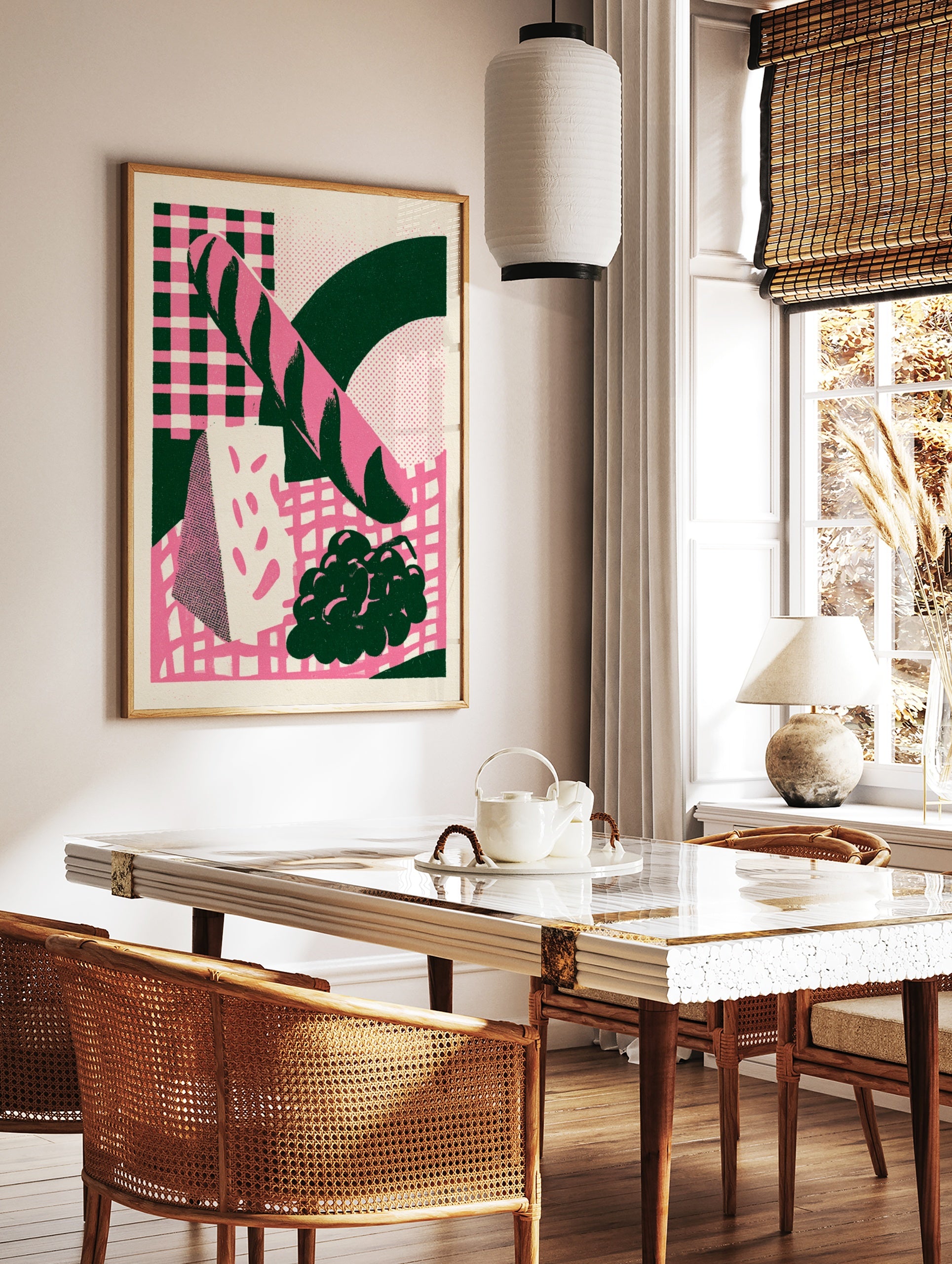 Retro illustration of a baguette, cheese, and grapes in pink and dark green on a checkerboard, in a styled room mockup