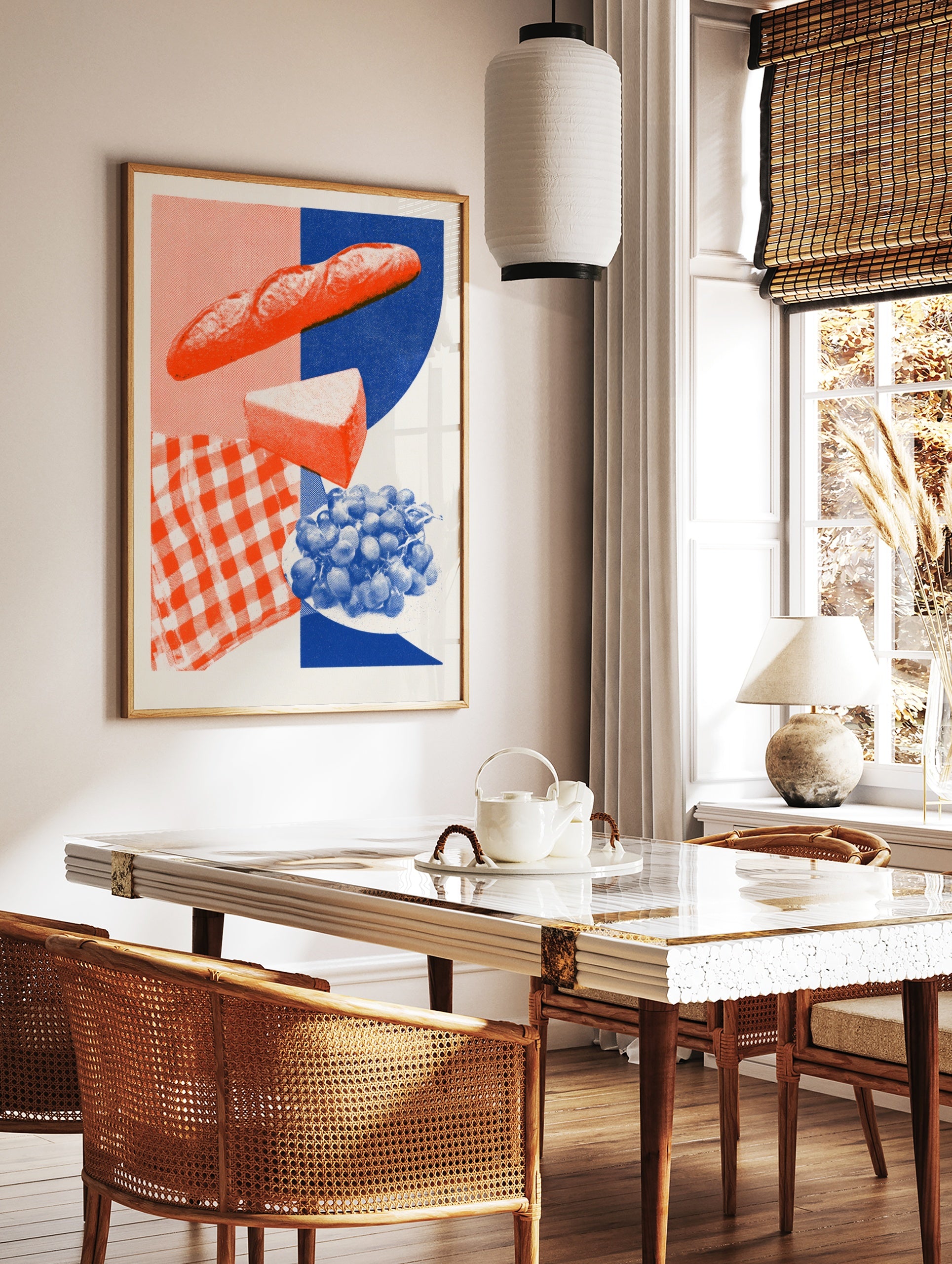 Graphic food illustration of a baguette, cheese and grapes with a red gingham and blue background, in a styled room mockup