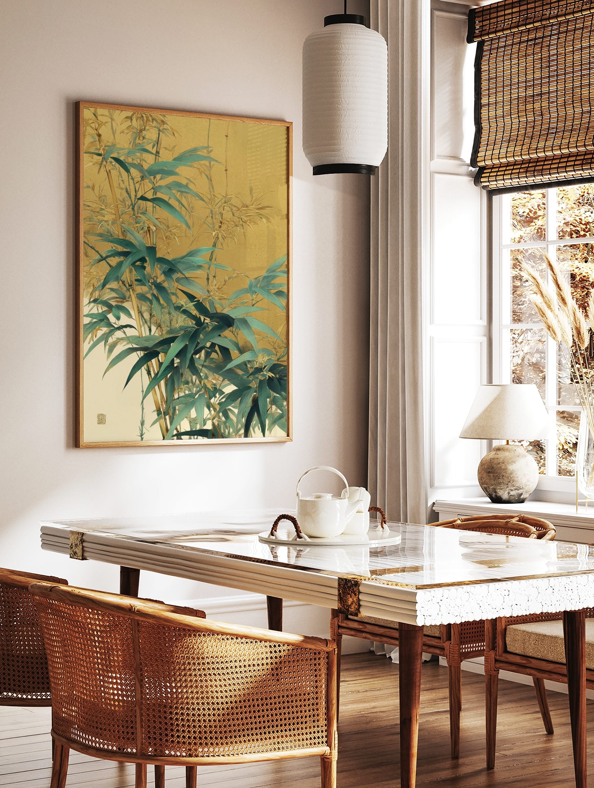 Illustrative bamboo leaves and stalks in green and gold against a muted warm background, botanical, in a styled room mockup
