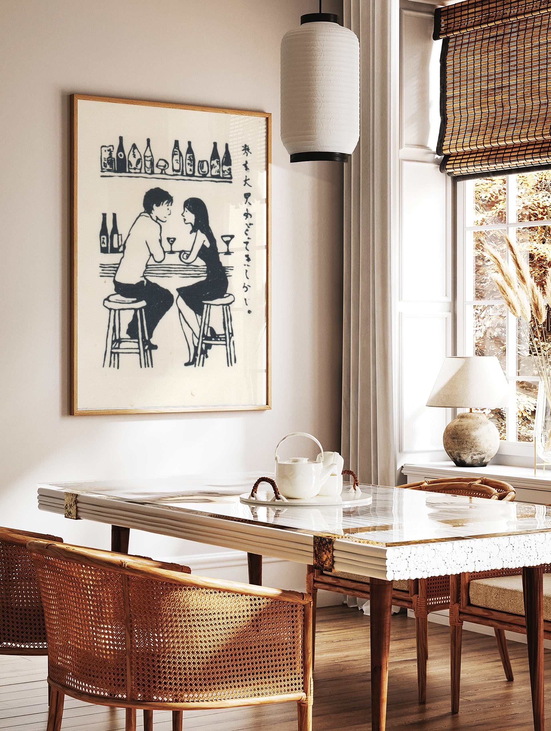 Monochrome illustrative print of a man and woman talking at a bar, with drinks and Japanese script, in a styled room mockup