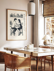 Monochrome illustrative print of a man and woman talking at a bar, with drinks and Japanese script, in a styled room mockup