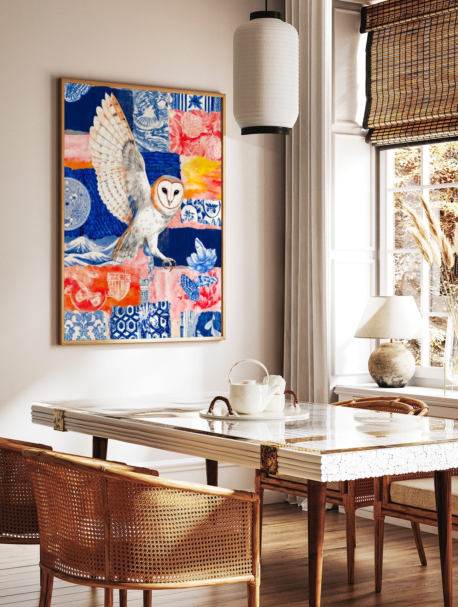 Barn owl in flight over a colourful collage background with blue Japanese patterns, red flowers, in a styled room mockup