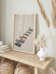 Beach chairs poster with blue, red, and yellow striped chairs lined up on a beige sandy beach under sunlight. - Image 4