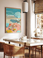 Impressionist painting of a beach picnic with rosé wine, fruit, a striped umbrella, and ocean waves, in a styled room mockup