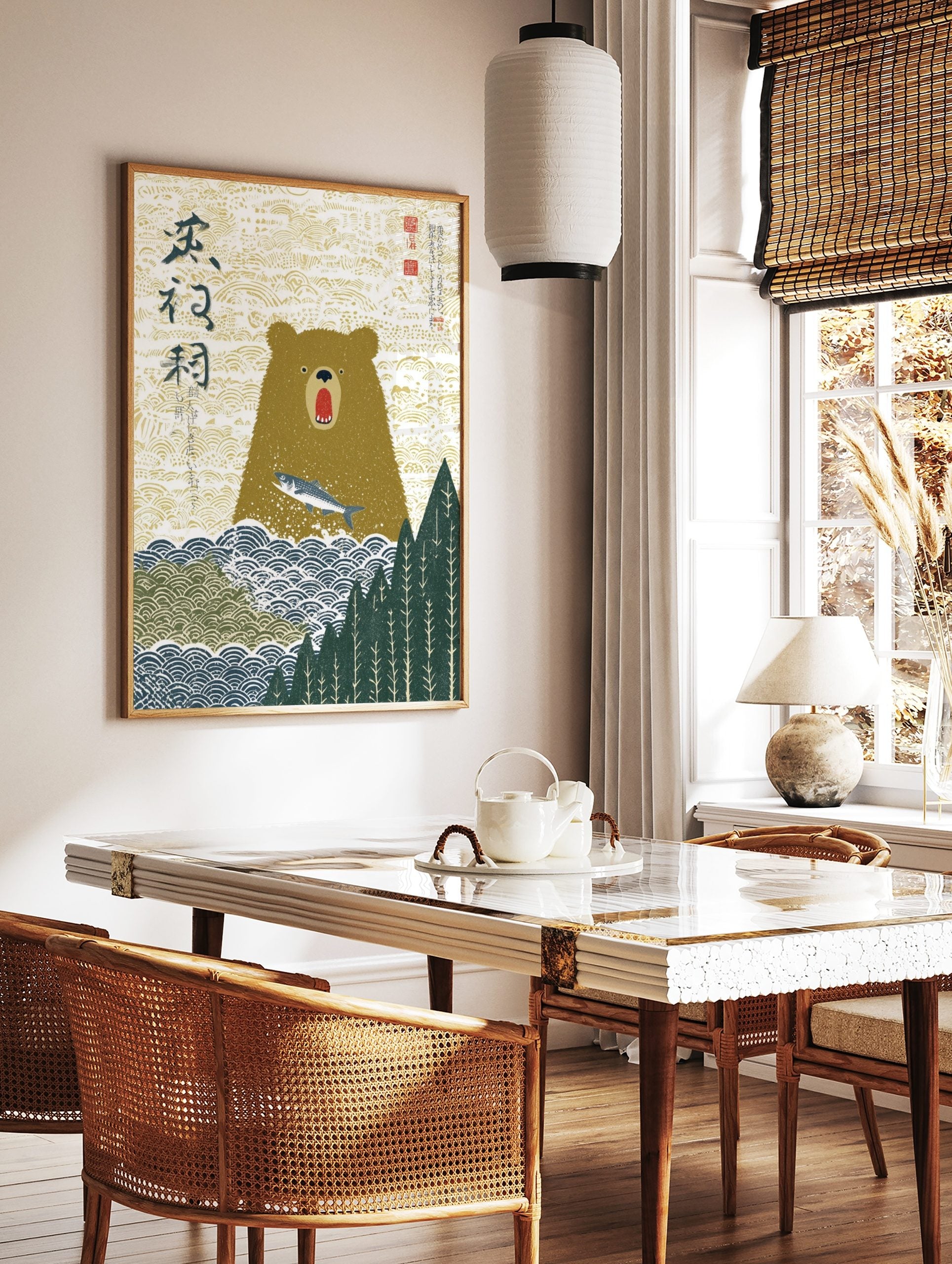 Illustrative Japanese art print of a brown bear with open mouth and leaping silver fish, with kanji, in a styled room mockup