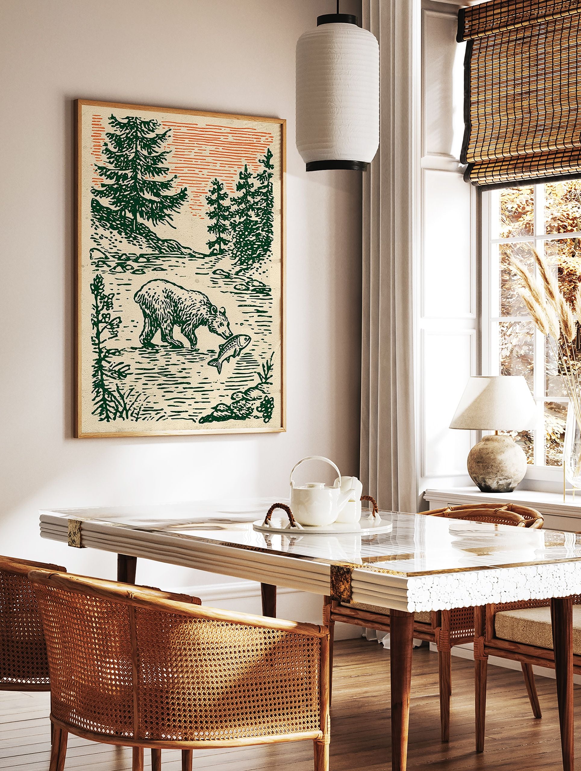 Illustrative art print of a bear catching a fish in a river, surrounded by green pine trees under an orange sky. - Image 3