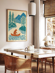 Brown bear paddling orange canoe on blue river with teal trees and blue mountains in illustrative, in a styled room mockup