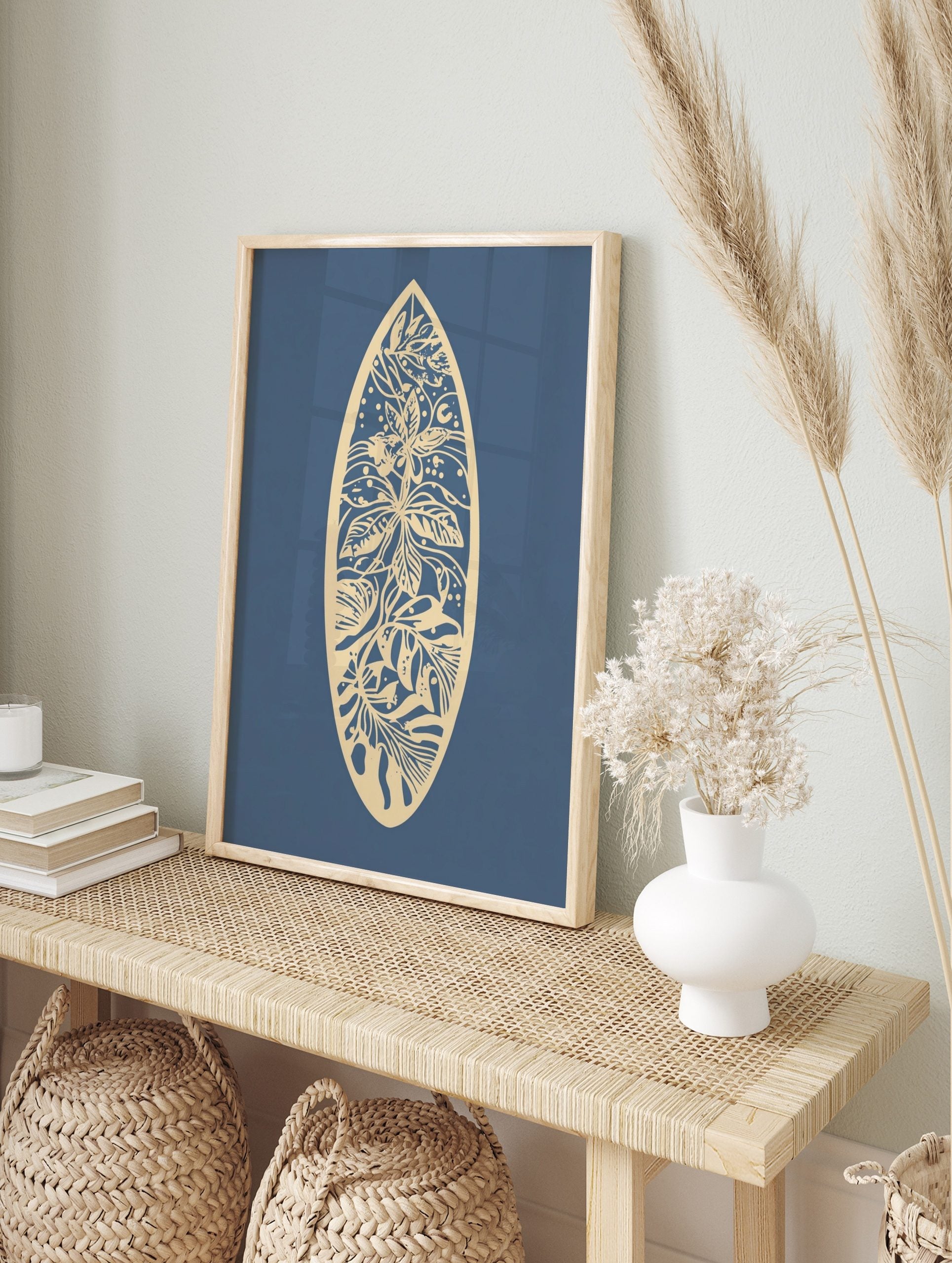 Beige botanical floral pattern within a surfboard shape on a deep blue background, unframed, in an alternate framed mockup