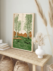 Illustrative print of birch trees, ducks in green water, flying birds, and brown bushes in a, in an alternate framed mockup