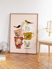 Illustration of two birds on a stack of floral teacups on a pink background - Image 2