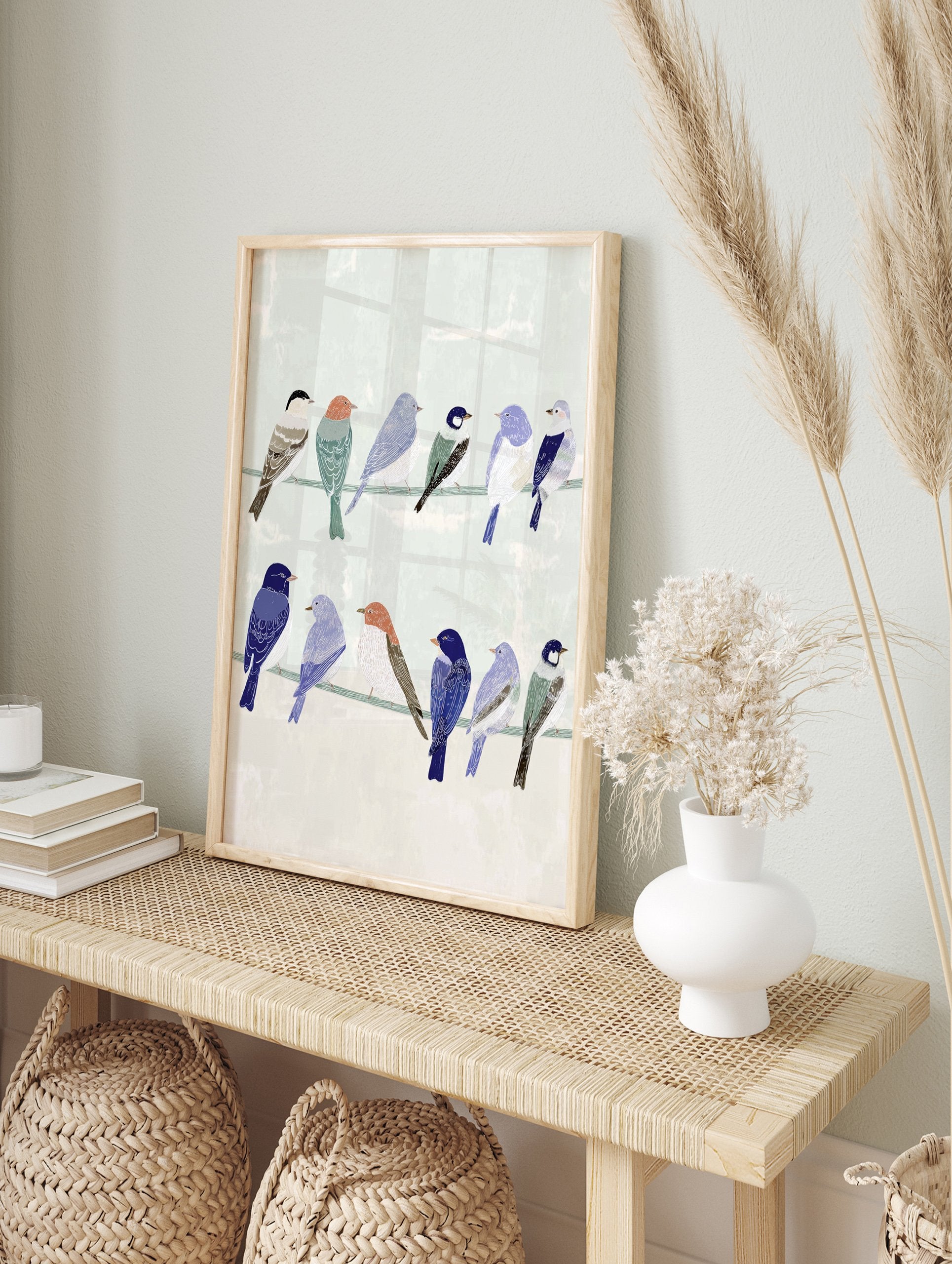 Illustrative bird wall art featuring a group of colorful songbirds perched on two wires against a pale green background - Image 3