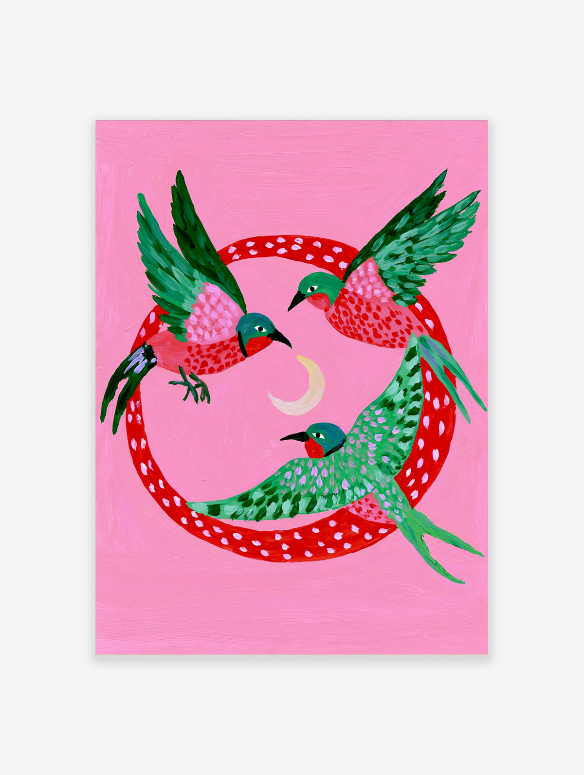 Three stylized birds with green and pink wings flying around a crescent moon inside a red polka-dot circle on pink paper