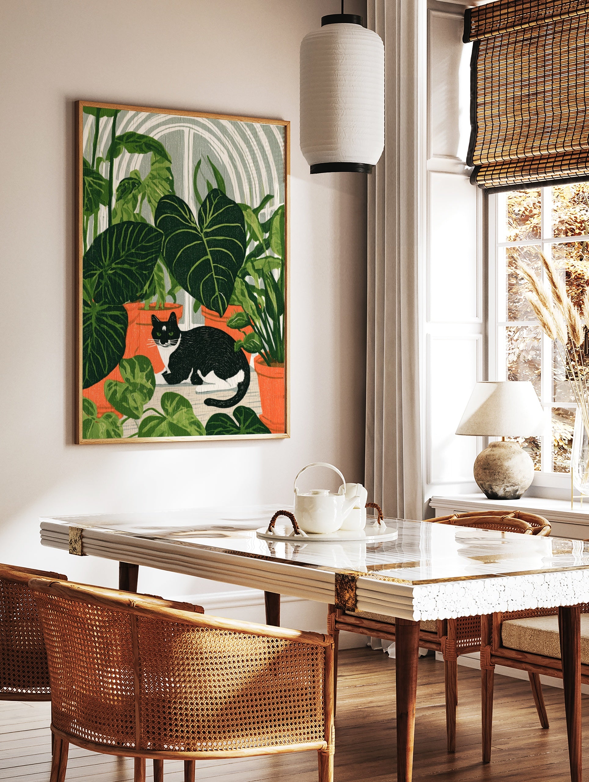 Black and white cat sitting among large green house plants in terracotta pots, botanical, in a styled room mockup