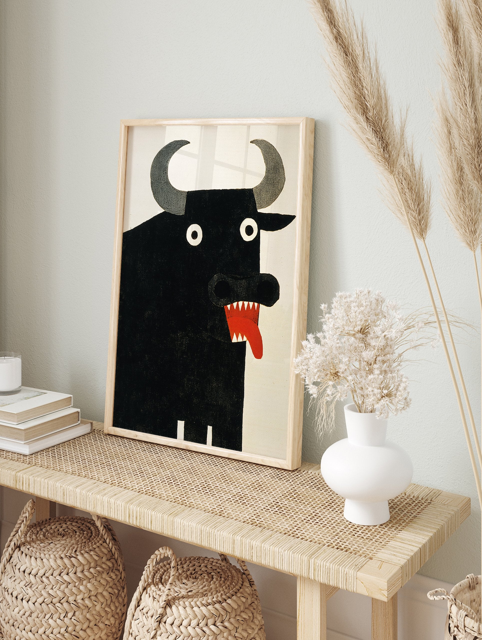 A black bull poster with large grey horns, white eyes, and a red mouth with sharp teeth and tongue against a white background. - Image 4