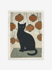 Black cat with green eyes sitting amidst hanging orange lanterns in Japanese woodblock style print