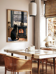 Black cat sitting before a glowing cast-iron stove, looking out a window at a snowy forest scene, in a styled room mockup