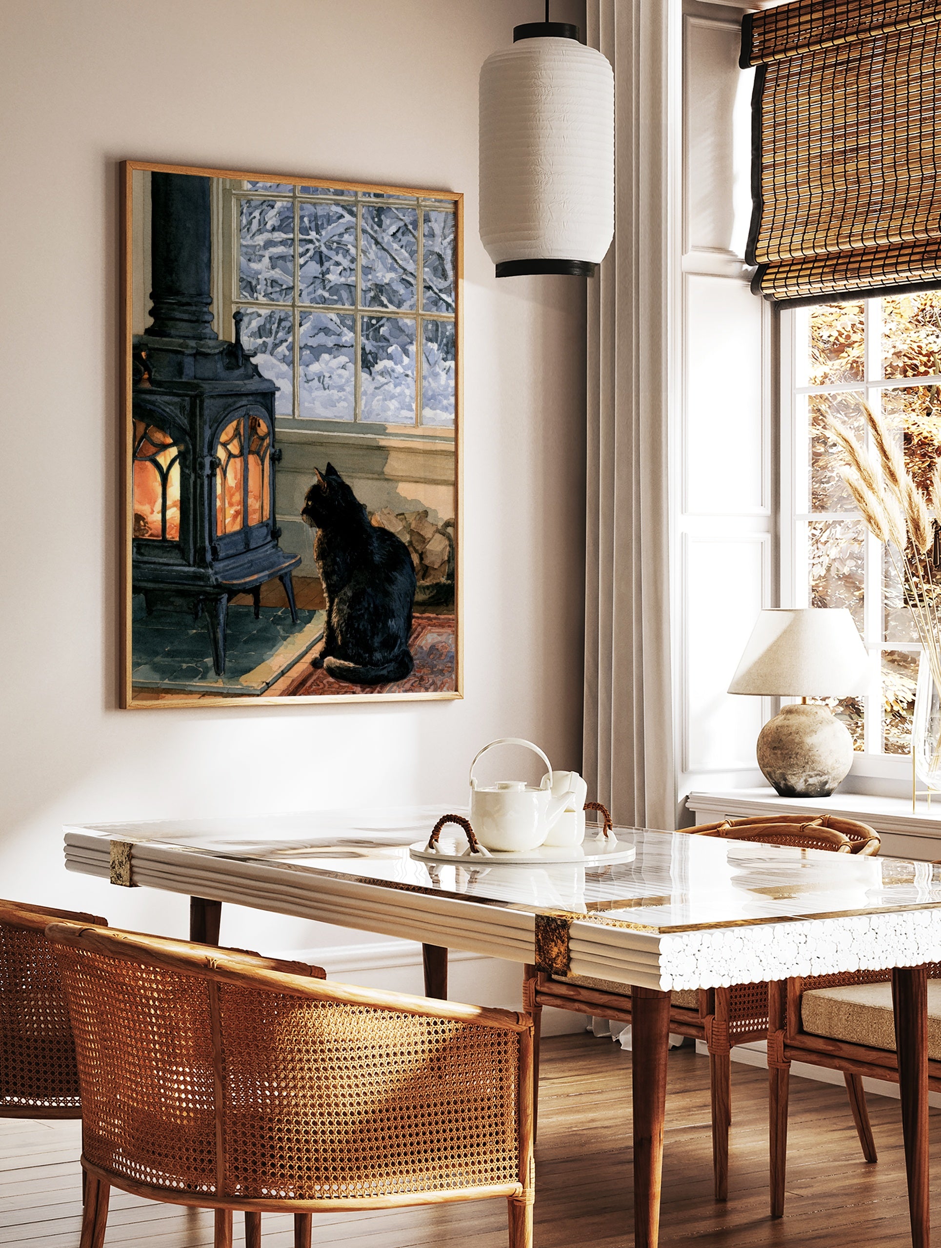 Illustrative print of a black cat sitting before a glowing wood-burning stove with a snowy winter, in a styled room mockup