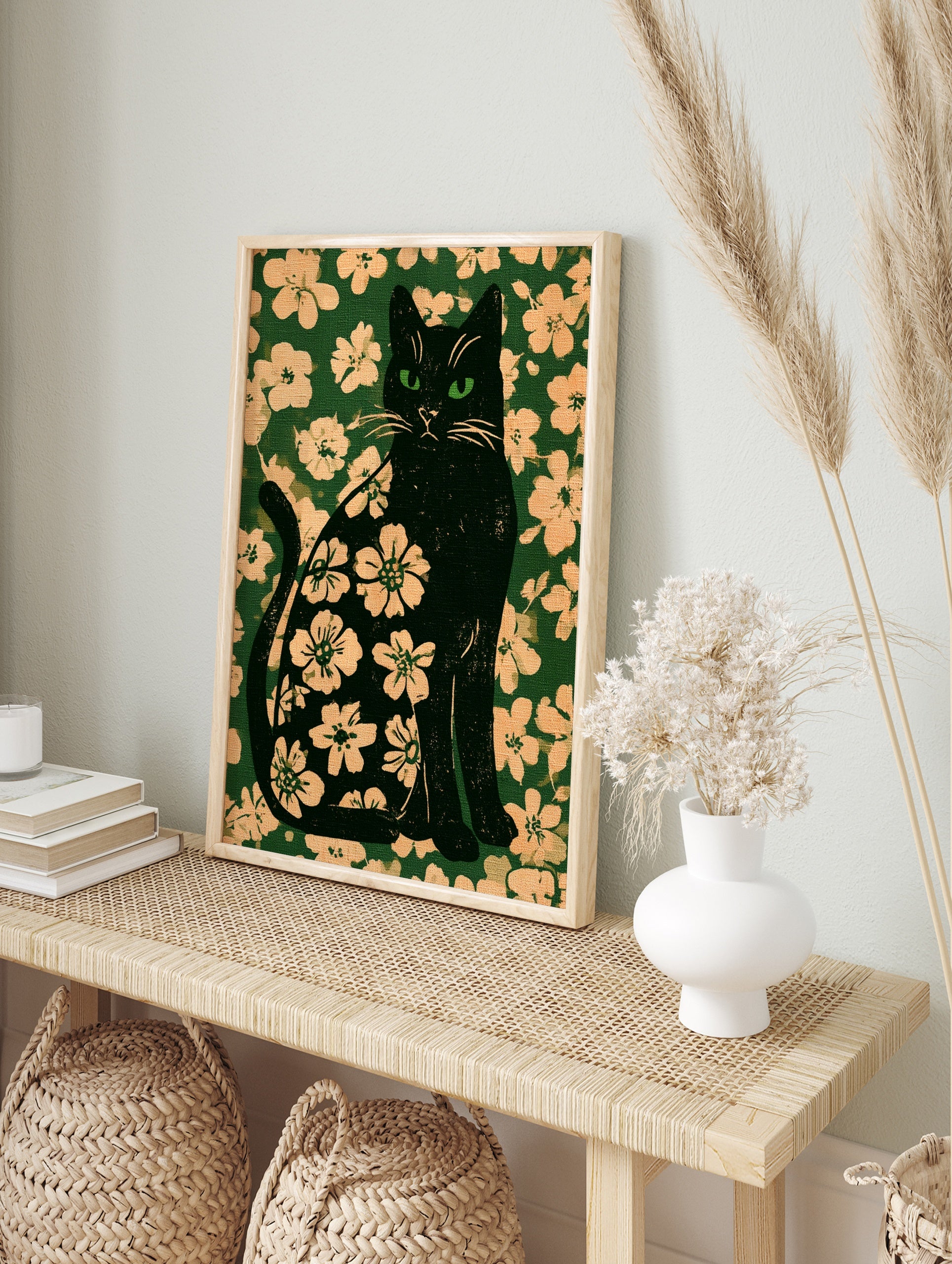 Black cat silhouette filled with a floral pattern set against a matching deep green botanical, in an alternate framed mockup