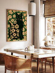 Black cat silhouette filled with a floral pattern set against a matching deep green botanical, in a styled room mockup
