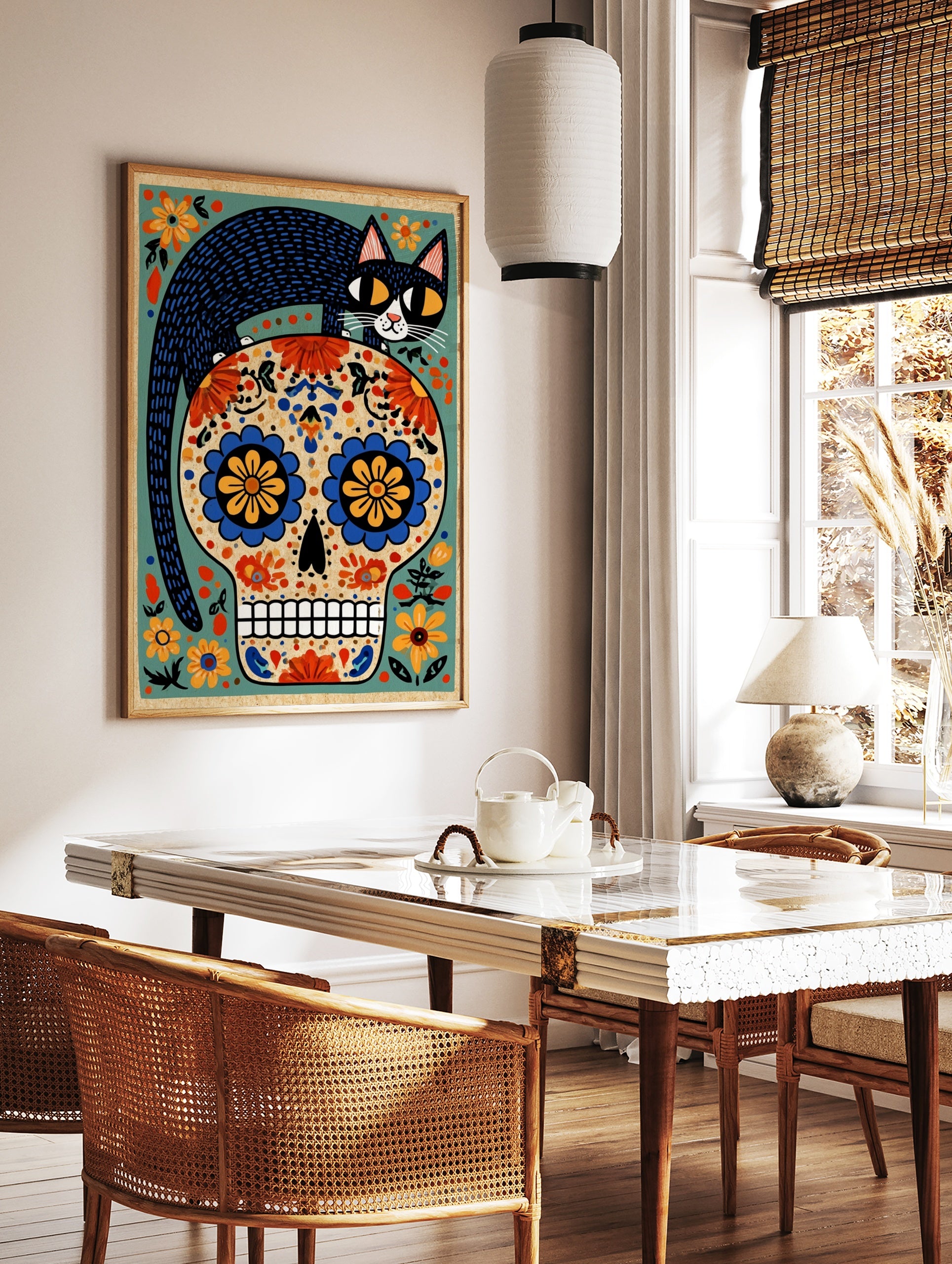Illustrative Day of the Dead skull with a black cat on top and colourful floral patterns on a beige, in a styled room mockup