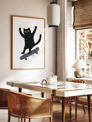 Black cat illustration on a skateboard with arms raised in excitement on a white background. Playful cat wall art. - Image 2