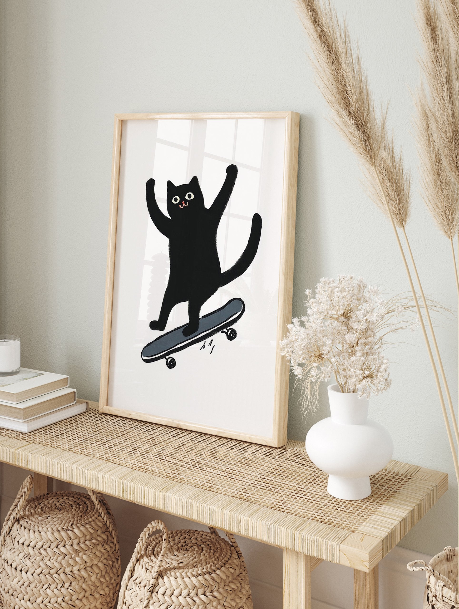 Black cat illustration on a skateboard with arms raised in excitement on a white background. Playful cat wall art. - Image 3