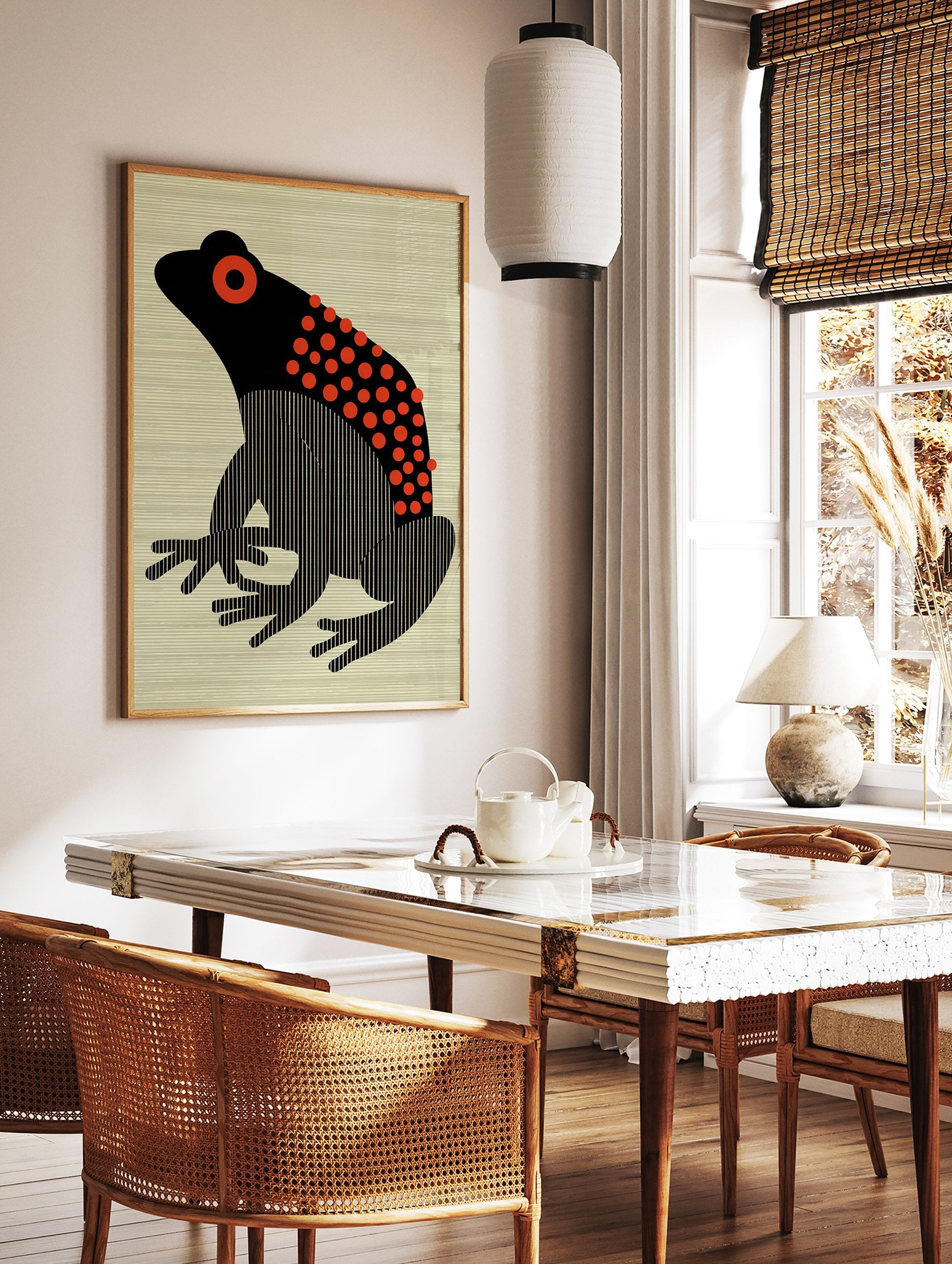 Black and red frog poster with stylized body, red polka dots, and vertical stripes, on a light beige striped background. - Image 2