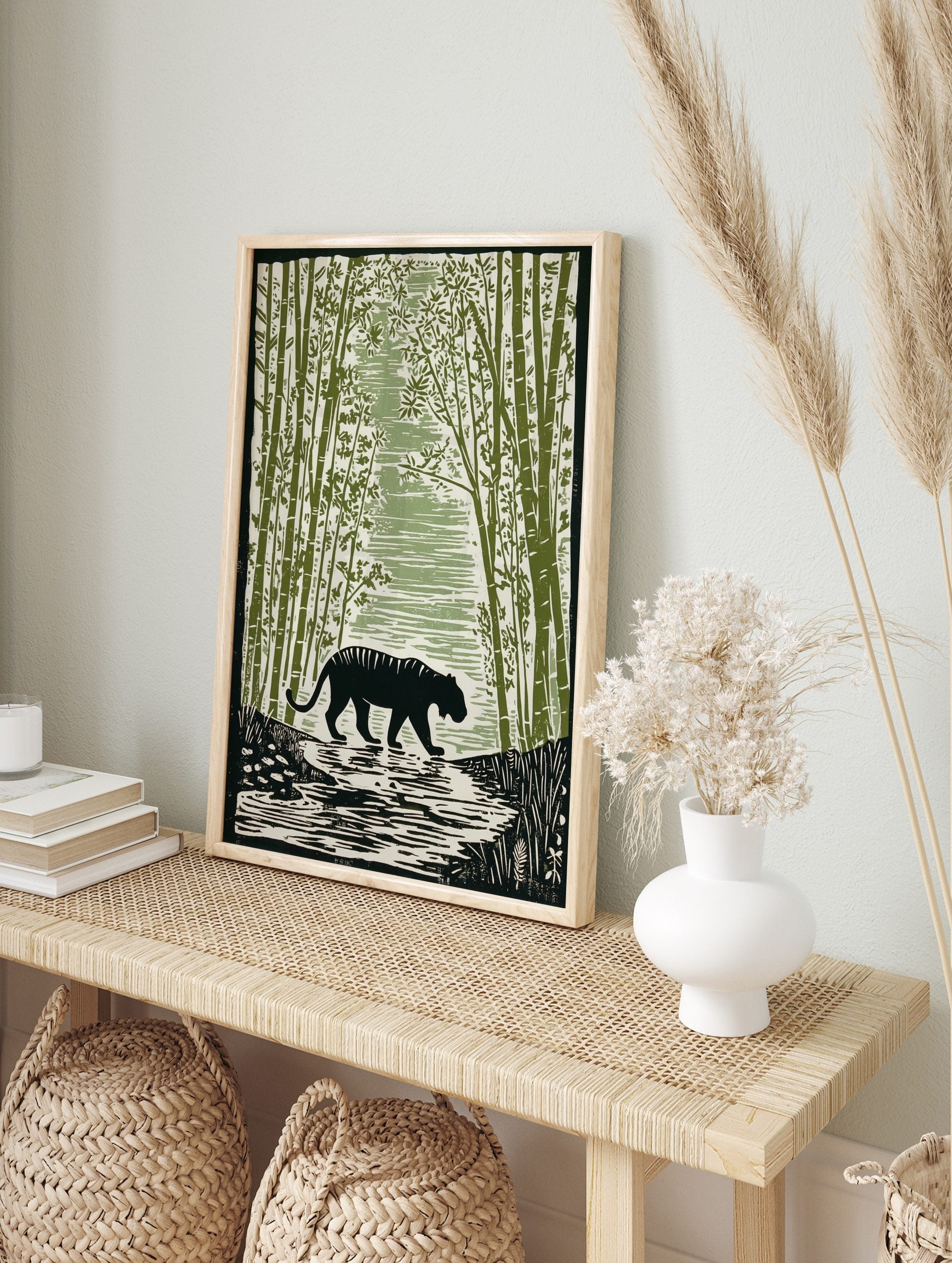 Illustrative black tiger with stripes walking through a green bamboo forest in a woodcut, in an alternate framed mockup