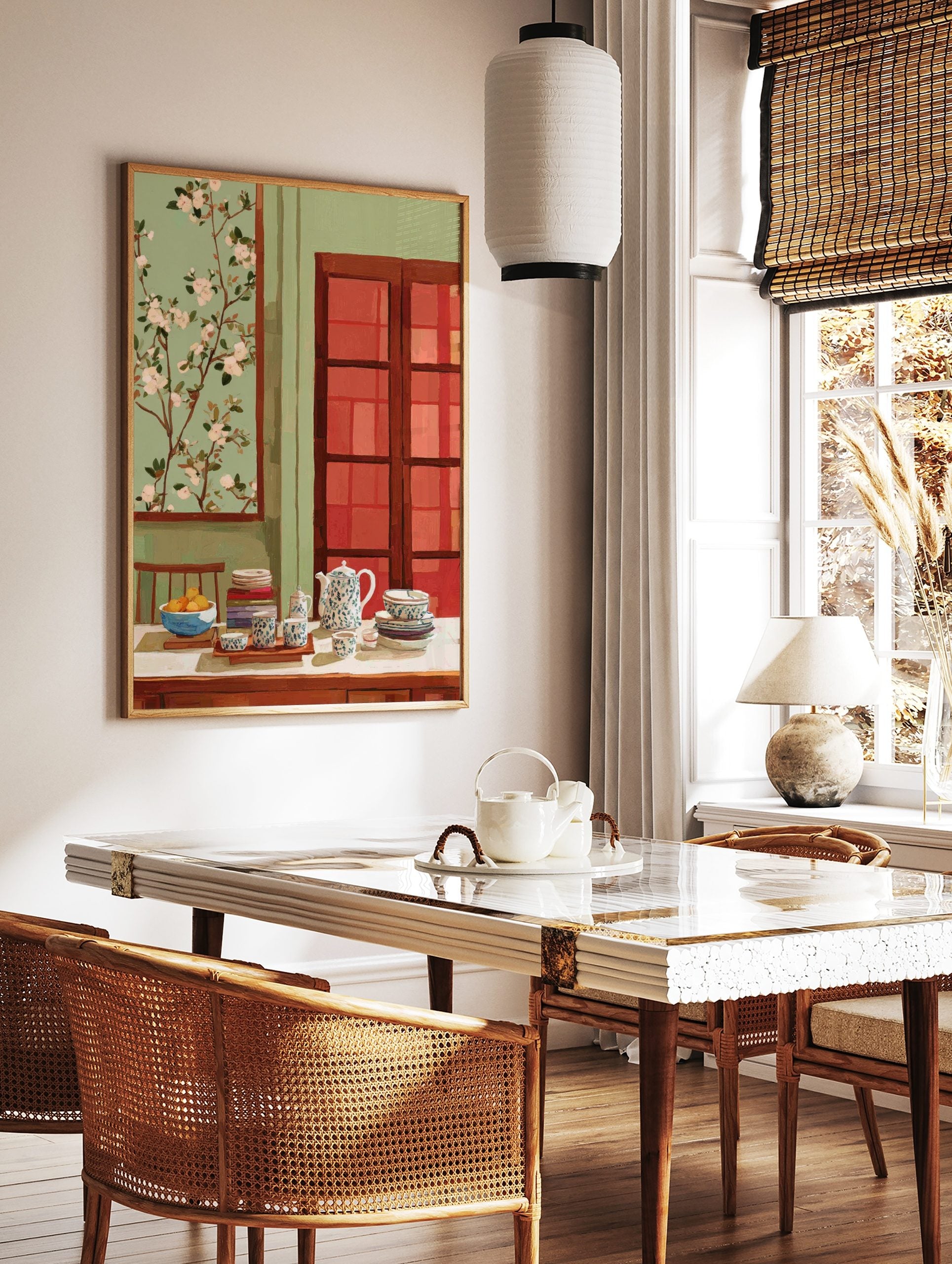 Still life painting of a teapot, tea cups, fruit bowl, and books on a table with blossom art, in a styled room mockup