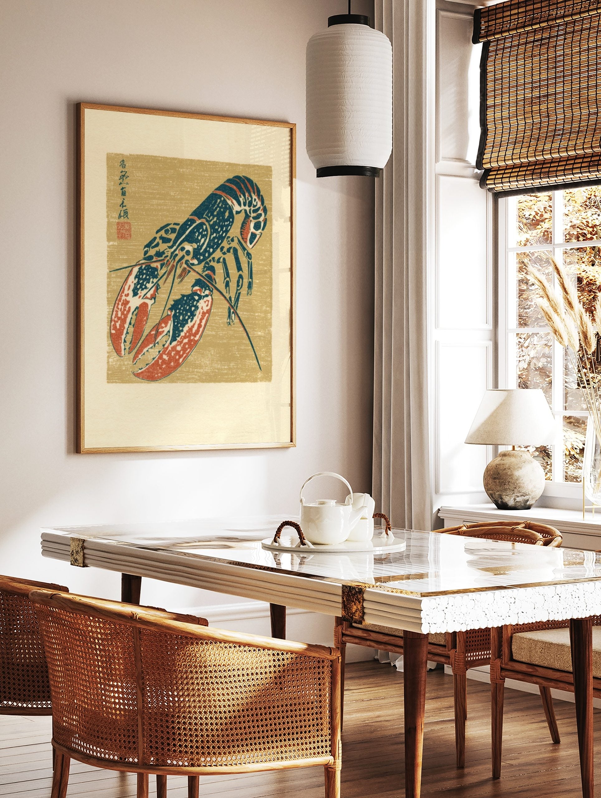 Japanese illustrative blue and red lobster print with kanji script on a tan background, in a styled room mockup