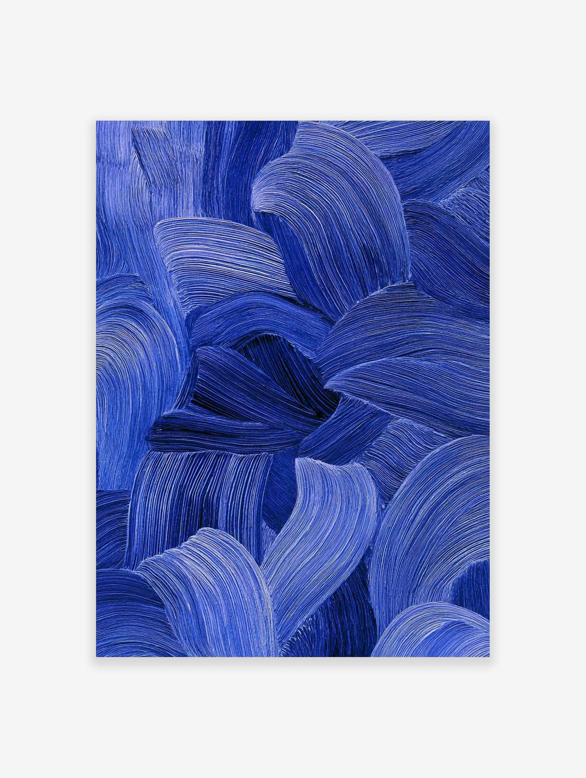 Close-up of blue abstract art with textured, flowing brushstrokes in indigo and cobalt tones