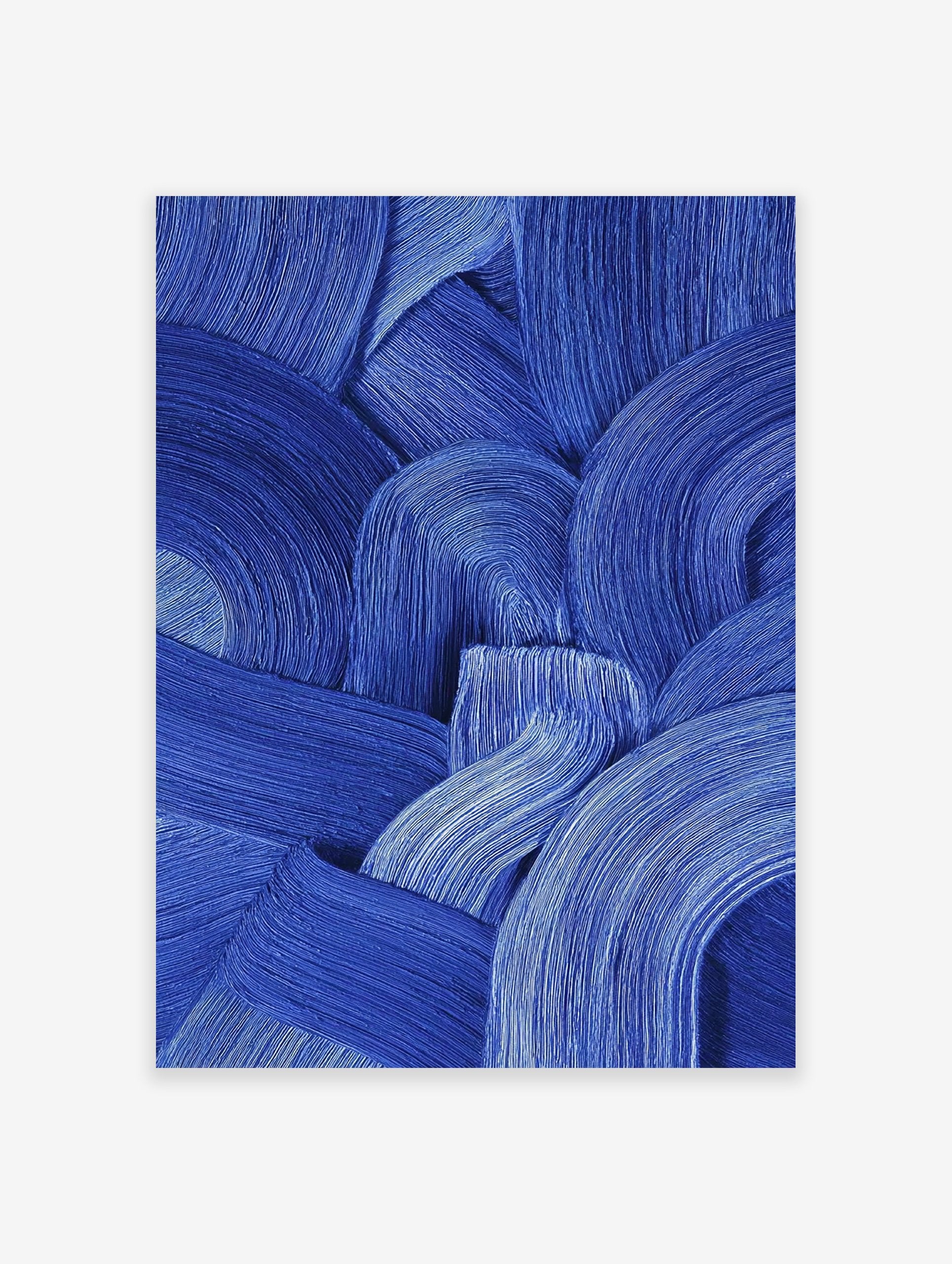 Blue abstract wall art featuring thick, textured brushstrokes forming curved and wavy patterns on a canvas.
