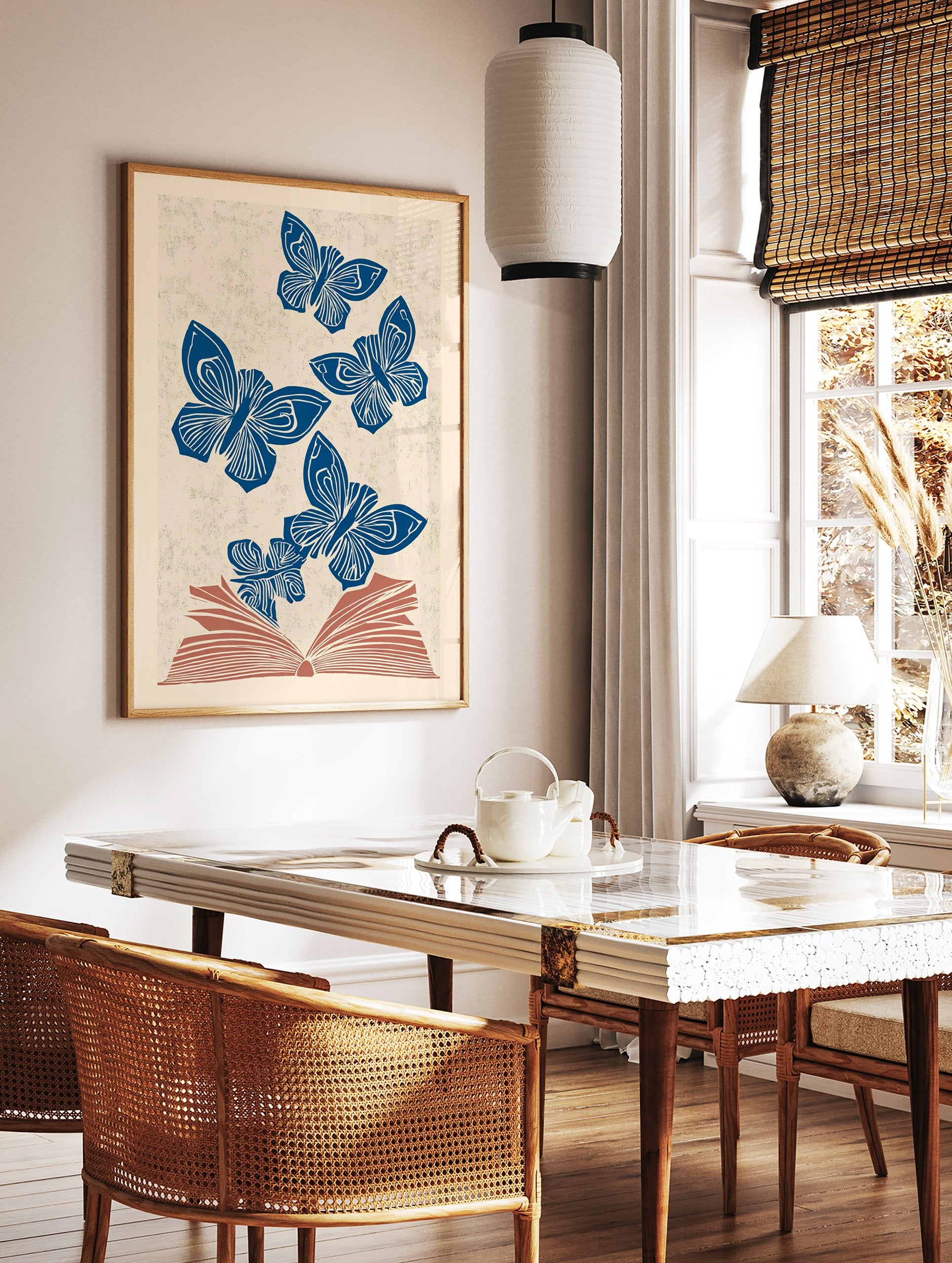 Blue butterfly wall art illustration of multiple butterflies flying out of an open book on a textured beige background. - Image 2