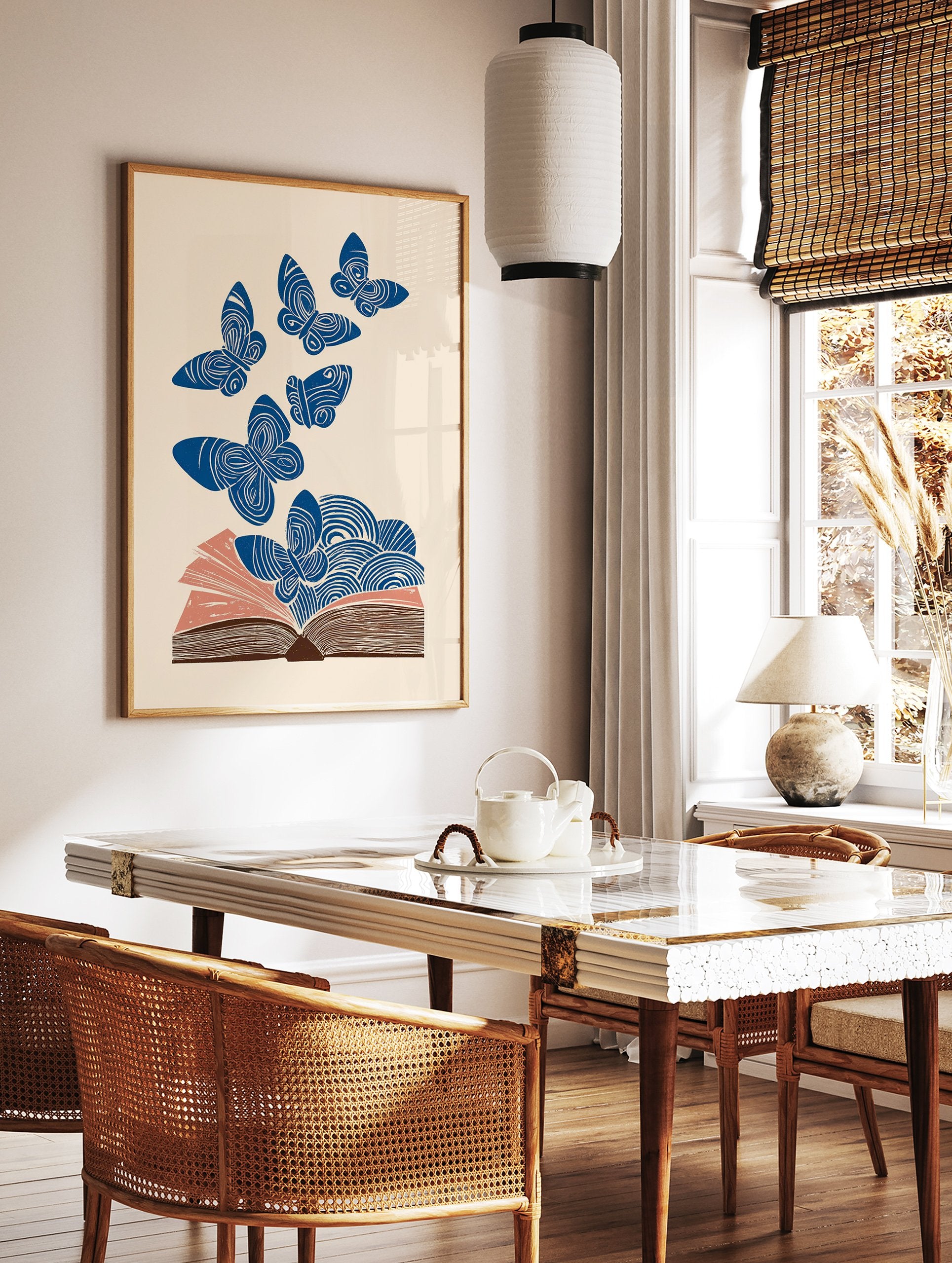 Blue butterfly wall art flying from an open book with swirling patterns on a cream background, illustrative style. - Image 2